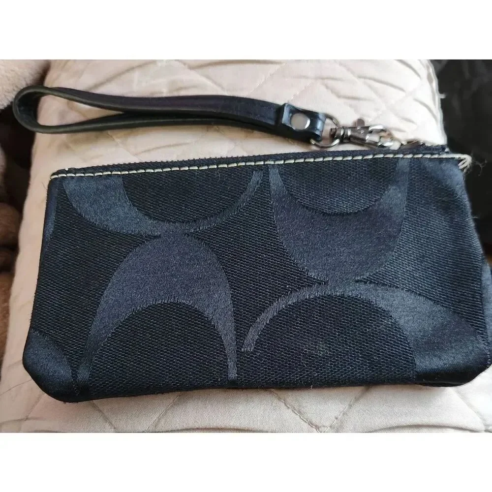 Coach signature canvas corner zip wristlet, black on black with Jacquard lining